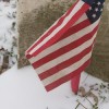 Headstone and Flag in Snow