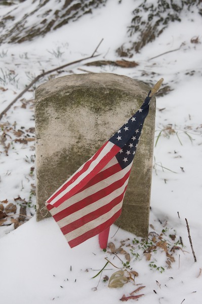 Headstone and Flag in Snow